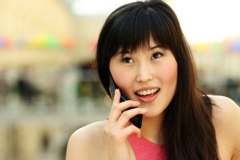 Close up of woman talking on cell phone 