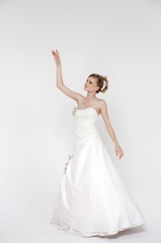Full length of bride wearing luxurious wedding dress 