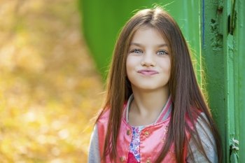 Beautiful Happy little girl outdoors 