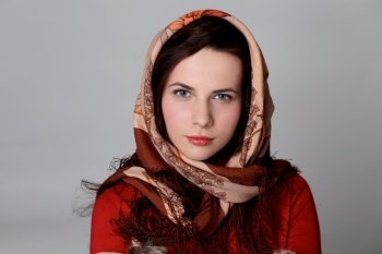 Beautiful woman on the red scarf