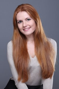 Studio portrait of red-haired girl