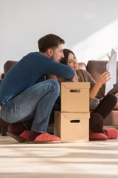 Couple moving in house - mortgage concept