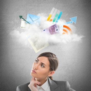 Businesswoman looking using cloud technologies to store her data and be free and mobile