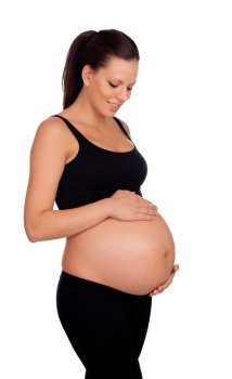 Brunette pregnant in black isolated on a white background