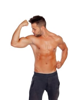 Muscular man showing his body isolated on white background