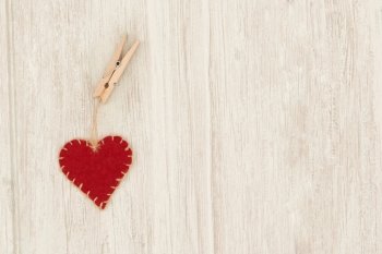 Valentine red hearts on grey wooden background