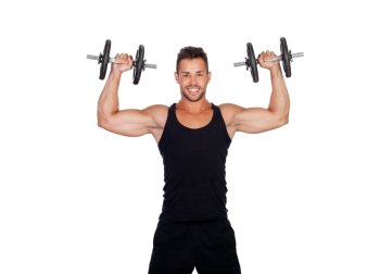 Handsome muscled man training isolated on a white background
