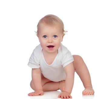 Adorable blonde baby in underwear crawling isolated on a white background