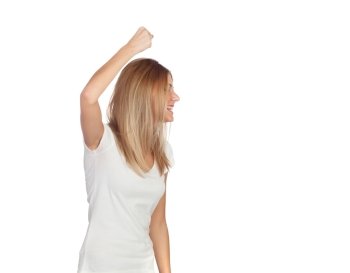 Blonde girl threatening her raised fist isolated on white background