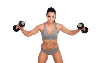 Attractive girl training with dumbbells isolated on a white background