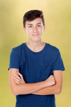 Brown young caucasian guy on yellow background