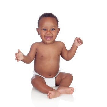 Adorable african baby in diaper sitting on the floor isolated on a white background
