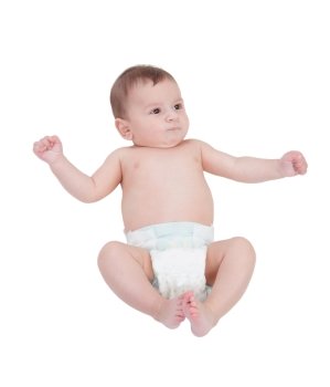 Little baby in diaper lying on the floor isolated on a white background