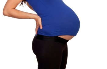 Pregnant woman with small t-shirt isolated on a white background
