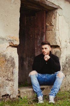 Attractive guy in a old house. Photos for ads