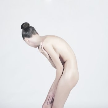black and white studio photo of elegant naked lady