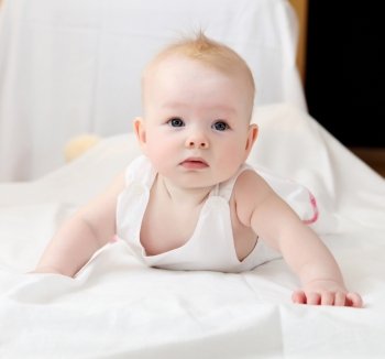 portrait of cute little infant on white