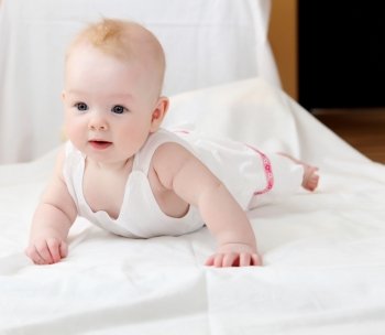 portrait of cute little infant on white