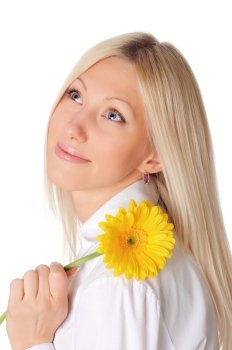 Young charming blonde is playing with a yellow flower isolated on white background