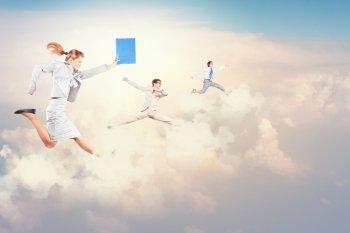Successful business people. Image of happy business people jumping high in sky