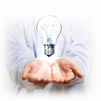 hand and lamp. Hand with lamp and hands of a business person