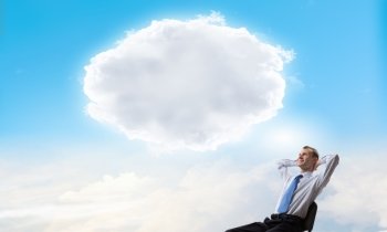 Let me think it over. Businessman in chair and blank thought cloud above his head