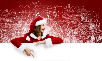 Santa girl with banner. Young attractive woman in santa suit holding blank banner. Place for text