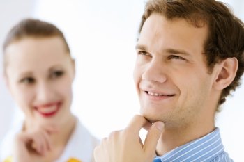 Successful businesspeople. Image of businessman and businesswoman smiling joyfully