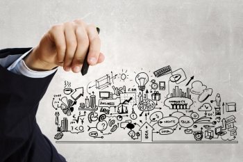 Business plan. Close up of businessman drawing business sketches on screen