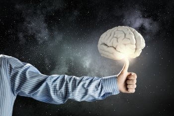 Mental health. Close up of businessman hand showing thumb up to brain