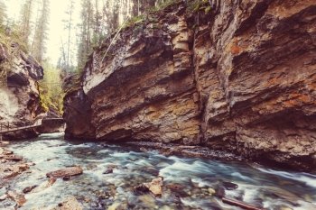 Johnston Canyon in Banff NP, Canada. Beautiful natural landscapes in British Columbia. Summer season.
