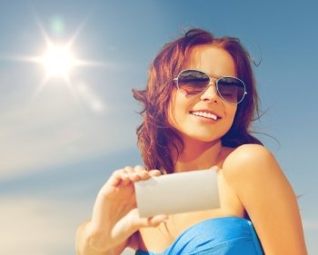 picture of happy smiling woman using phone camera .. happy smiling woman using phone camera