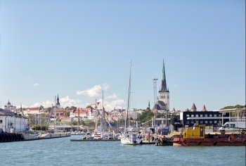 travel and tourism concept - view of sea port harbor and old town in tallinn city. sea port harbor and old town in tallinn city