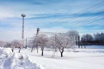 Railway station in winter. Snow-covered urban scene in Belarus