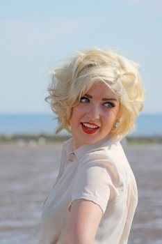 Beautiful blonde haired teenage girl who looks like Marilyn Monroe
