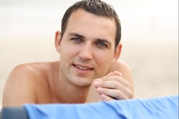 Handsome russian man at the beach 