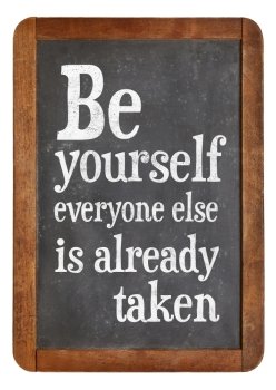 Be yourself, every one else is already taken - reminder on a vintage slate blackboard