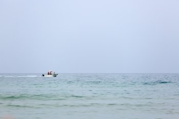 A small motor boat over mediterranean sea