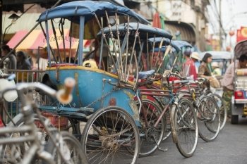 Bicycle Ricksha Taxis at the morning Market in Nothaburi in the north of city of Bangkok in Thailand in Southeastasia.. ASIA THAILAND BANGKOK NOTHABURI TRANSORT BICYCLE TAXI