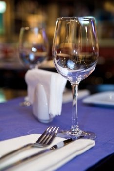 wineglass on served table in restaurant