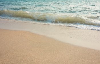 sea wave on beach sand