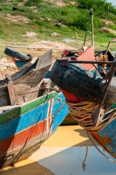 Detail of two wooden boats in asia. Detail of two wooden boats in Cambodia asia