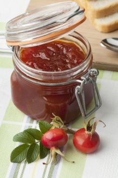 Jam with rose hips in a jar