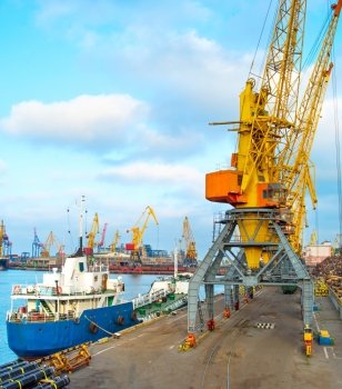 Cargo ships and cranes in seaport of Odessa, Ukraine