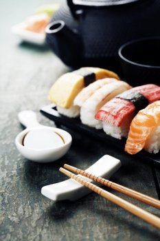 Closeup of fresh sushi  on rustic wooden table