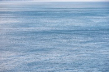 Blue ocean background. Blue ocean background landscape with deep blue water and wind