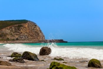 Algarve, Portugal, Europe.  Atlantic coast.  ocean waves of Atlantic Ocean
