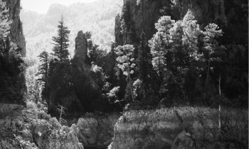 Rocks of Green Canyon lake in Turkey, black and white photo