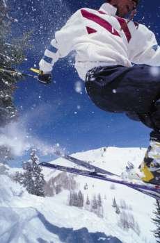 Close-up of a man skiing on a mountain