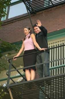 Young Couple on Fire Escape